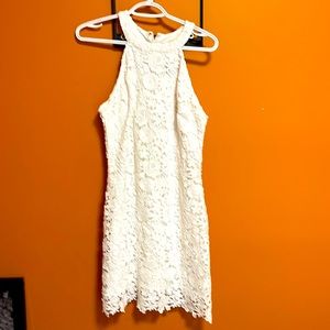 White stretchy lace dress with built in slip.